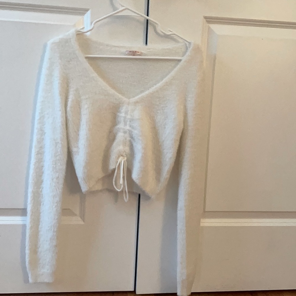 white cropped long sleeve center cinched top